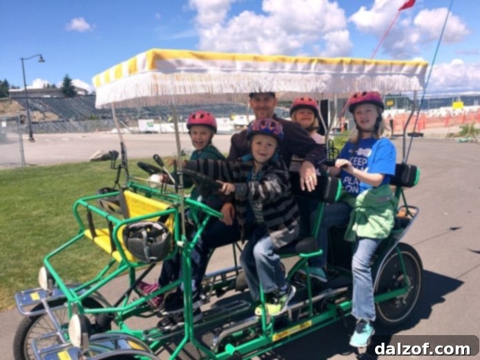 Family riding a surrey bike