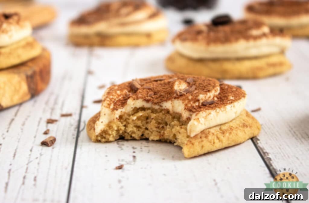 Soft Tiramisu Cookies are thick, chewy coffee cookies topped with a creamy mascarpone frosting and dusted with cocoa powder. Soft cookies that taste like your favorite Italian dessert! 