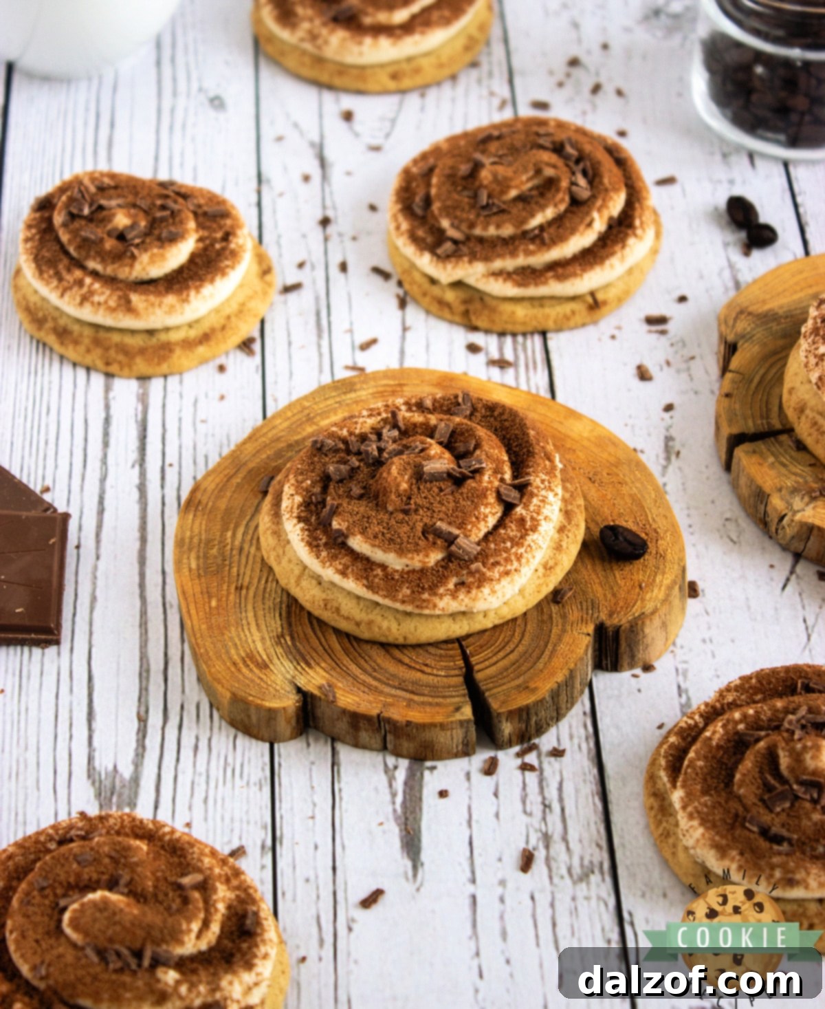 Add a dusting of cocoa powder and grated chocolate on top of the frosted cookies.