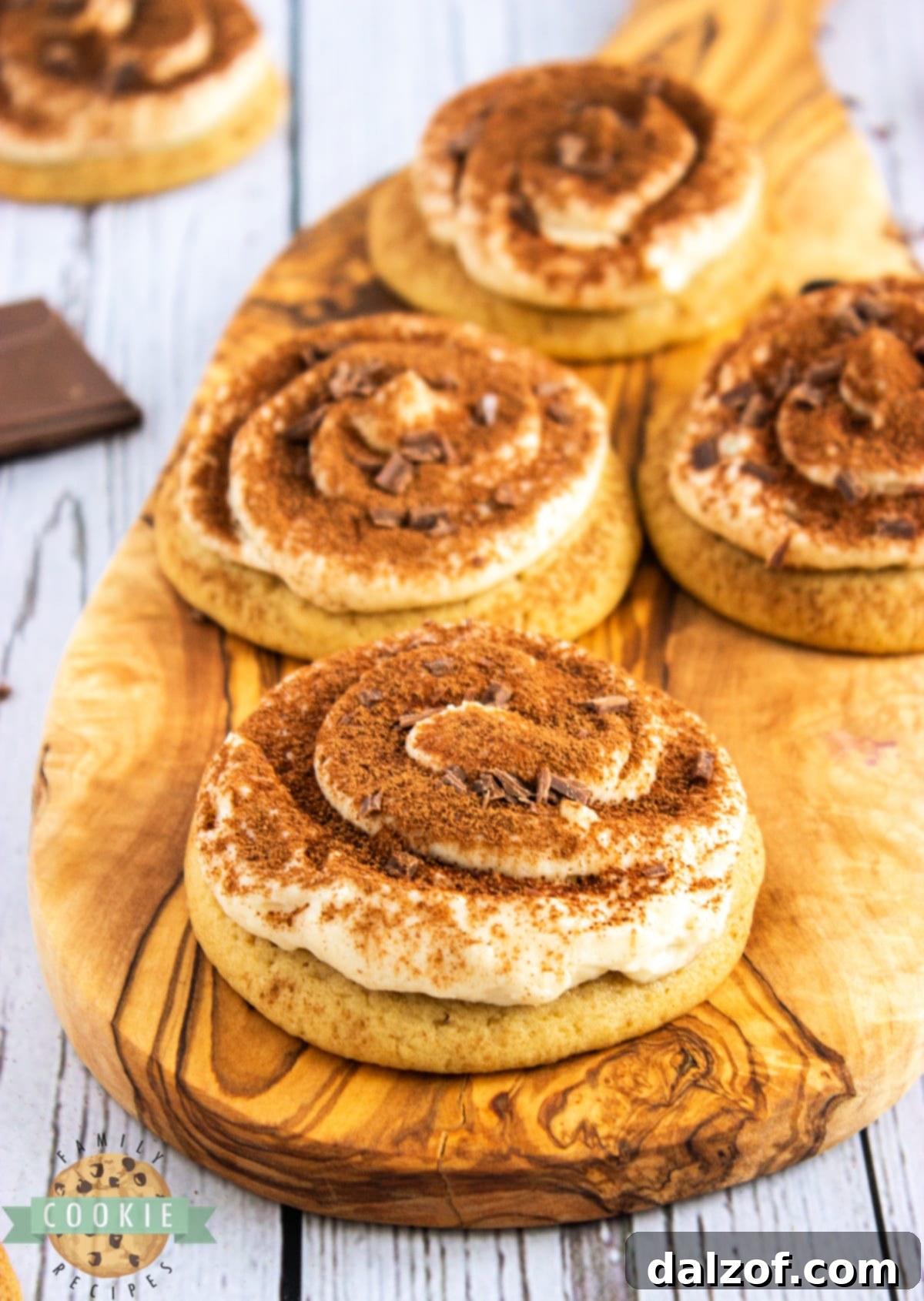 Soft Tiramisu Cookies are thick, chewy coffee cookies topped with a creamy mascarpone frosting and dusted with cocoa powder. Soft cookies that taste like your favorite Italian dessert! 
