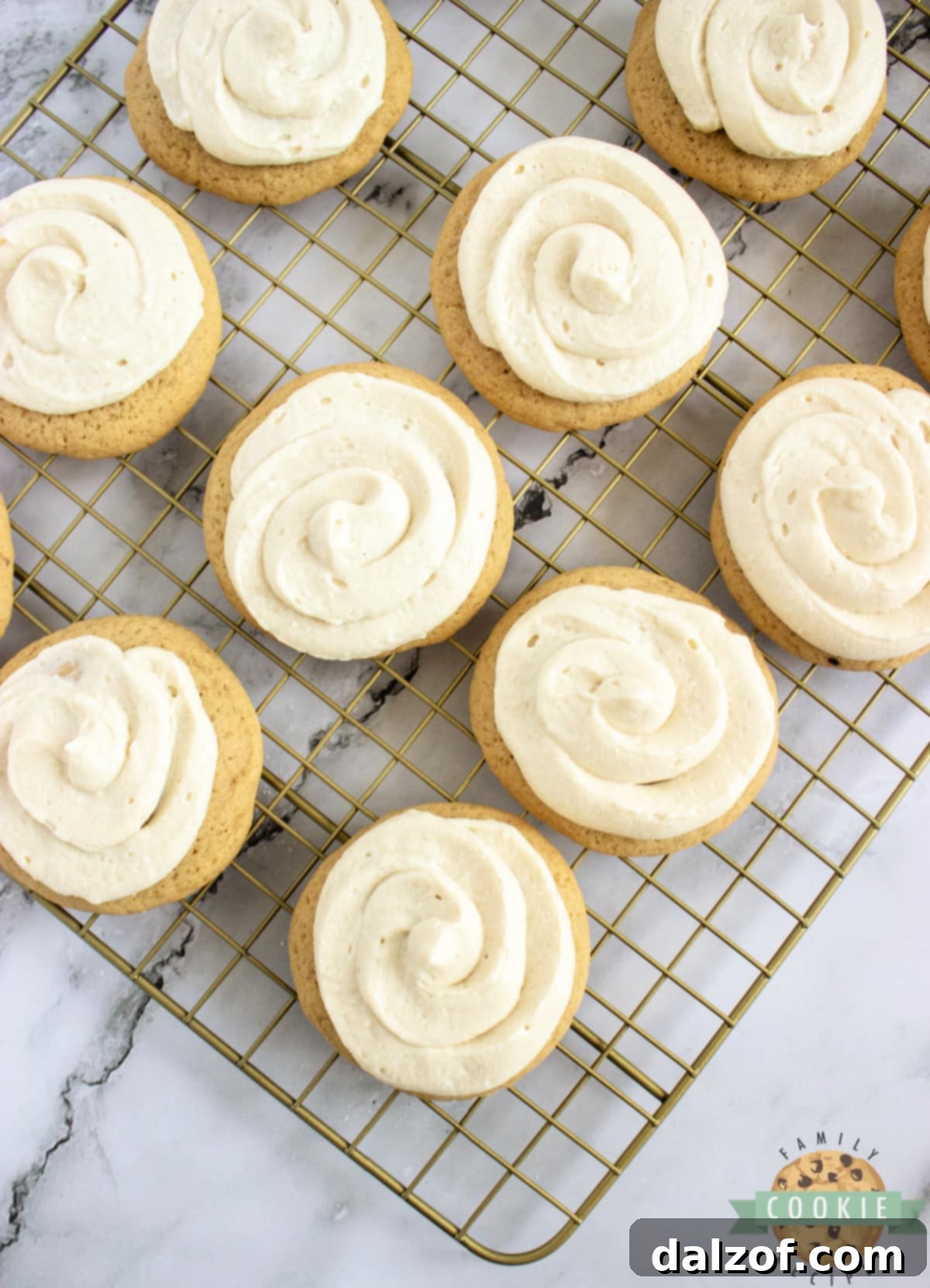 Pipe the frosting onto the cookies once they have cooled completely.