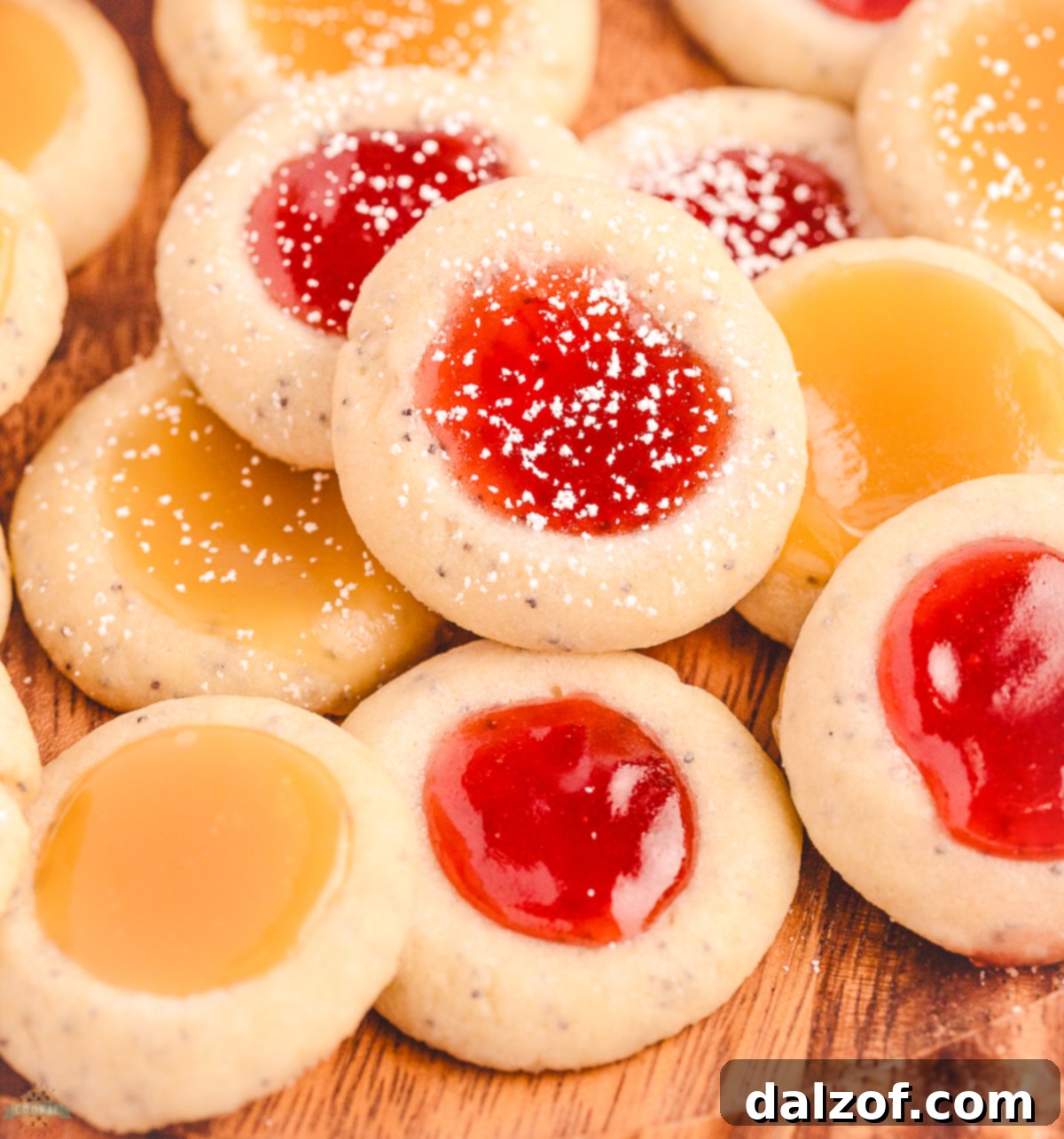 Poppy Seed Thumbprint Cookies with strawberry jam and lemon curd