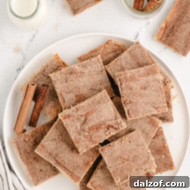 Snickerdoodle Cookie Bars, soft, thick, and perfectly baked in a sheet pan, ready for slicing and serving.