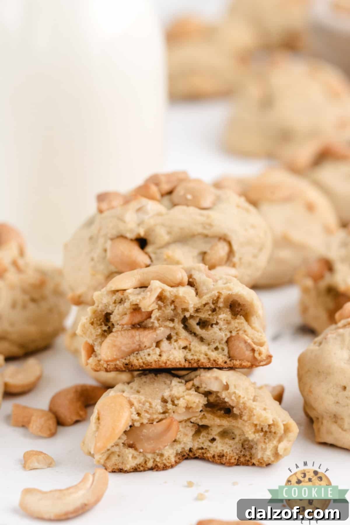 Close-up of baked Cashew Cookies, showing the golden-brown edges and visible cashew pieces for a delicious sweet and salty flavor.