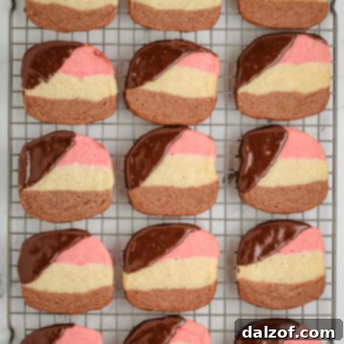 Slice and bake layered Neapolitan cookies with chocolate dip