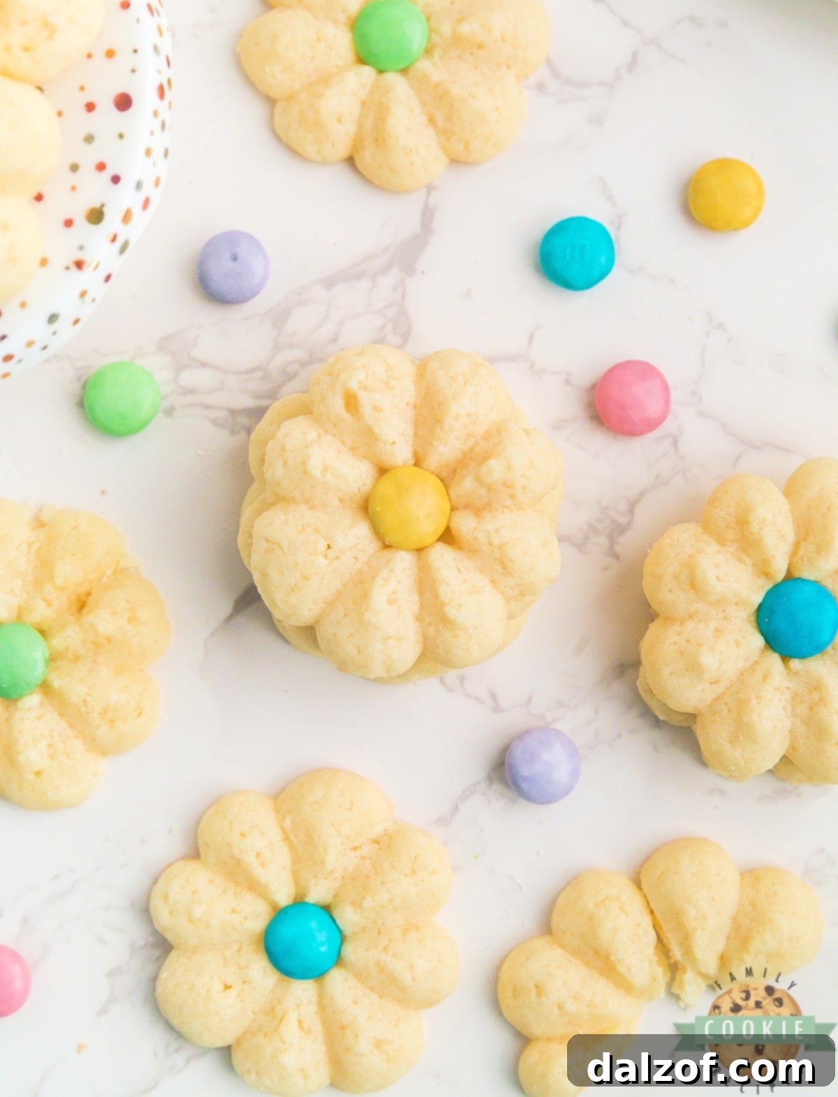 A close-up of beautifully simple shortbread flower cookies, showcasing their delicate texture and uniform shape.