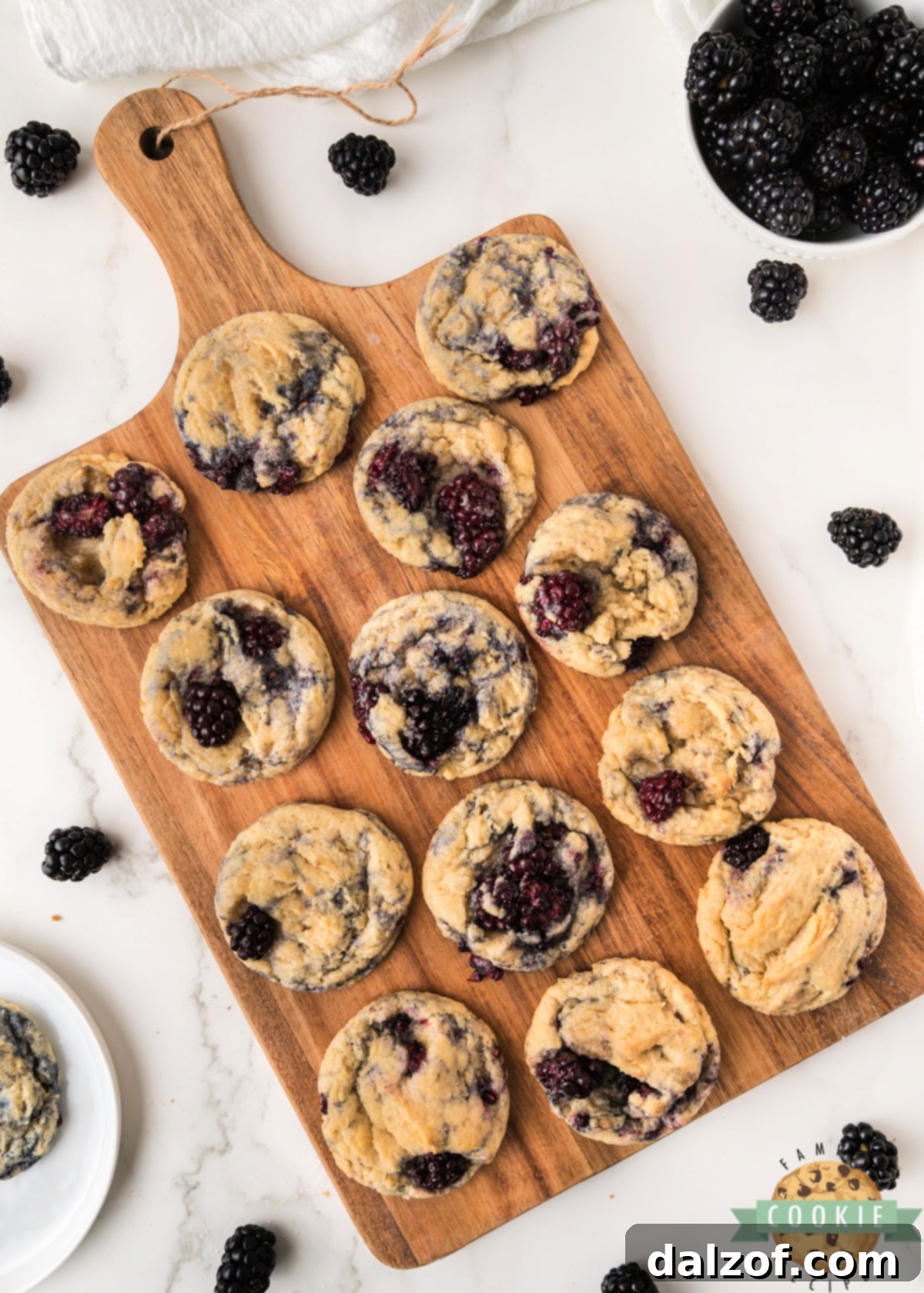 Various Blackberry Cookies showcasing their soft texture and the inclusion of fresh blackberries throughout each cookie.
