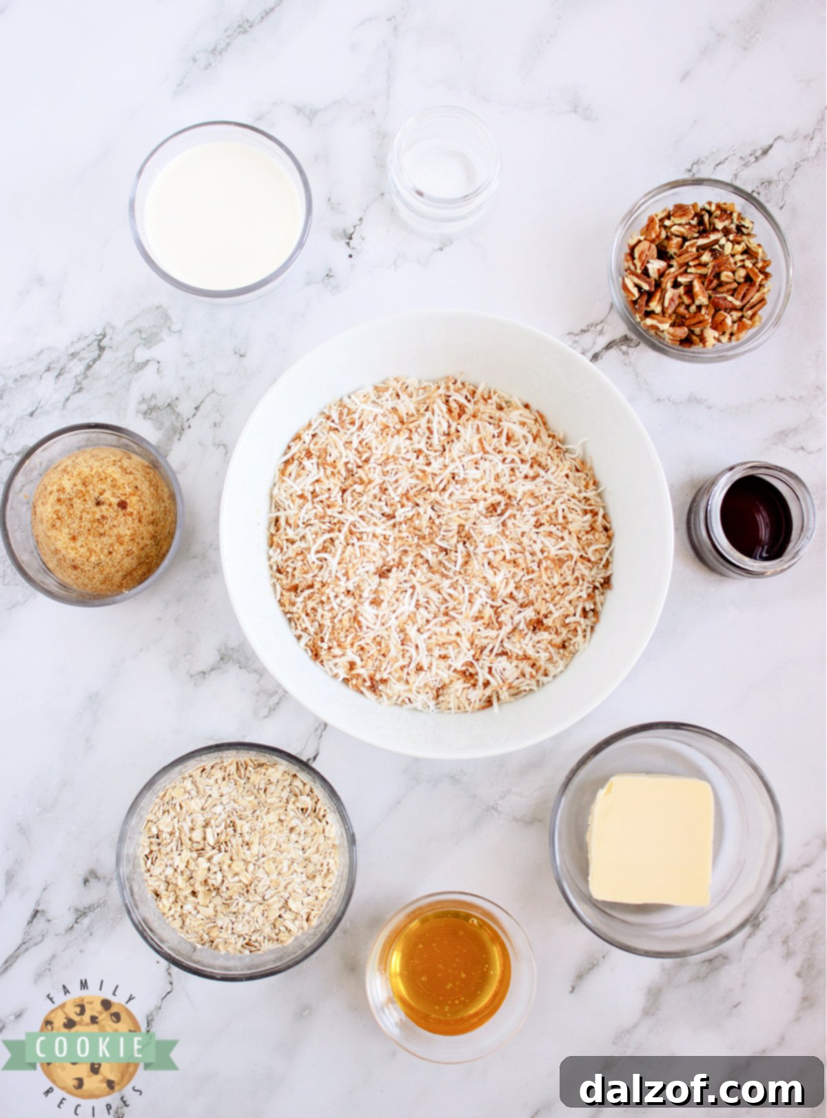 A close-up of the ingredients used in Caramel Coconut No-Bake Cookies, including butter, brown sugar, honey, cream, toasted shredded coconut, and oats.