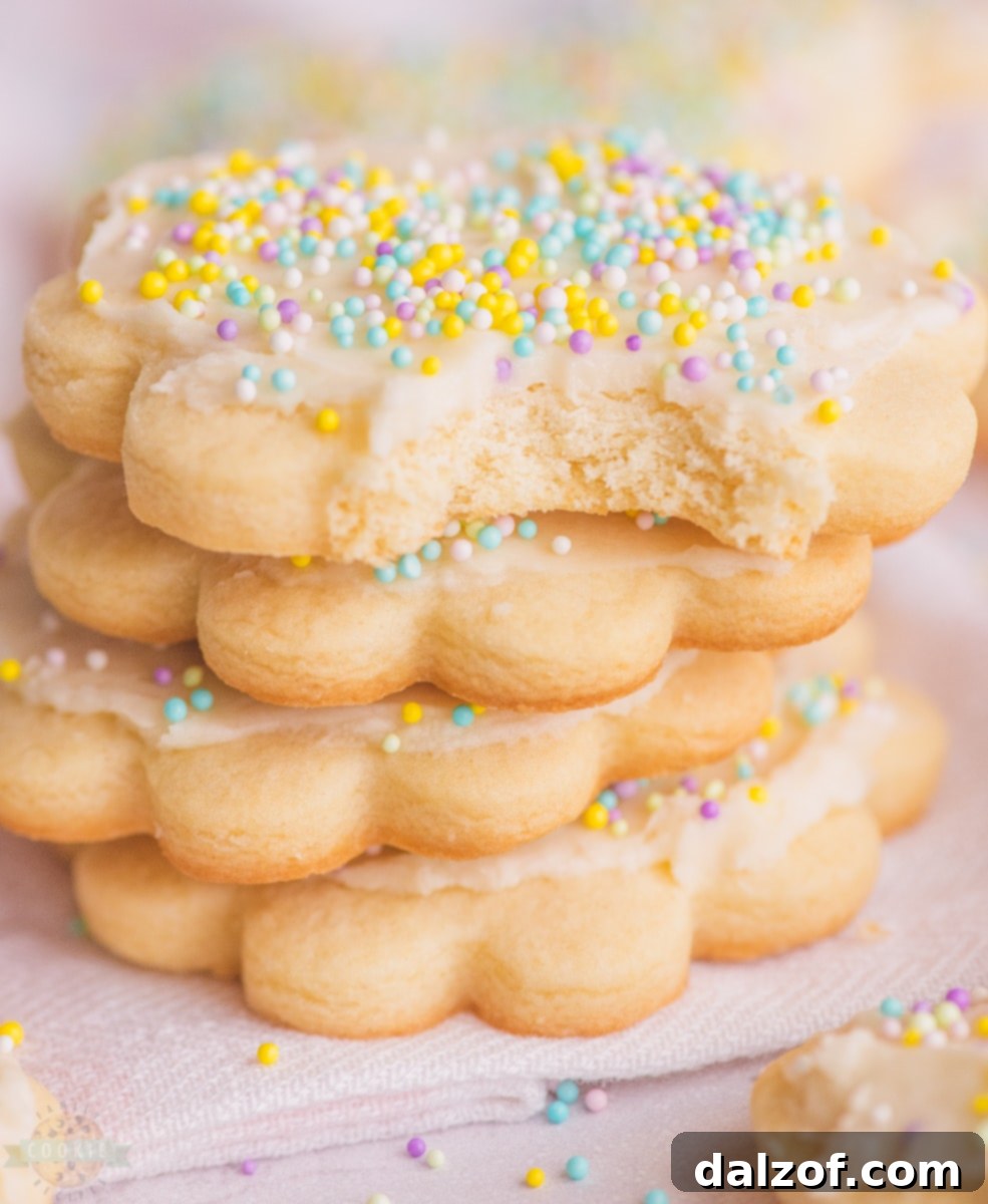 Soft, buttery vanilla sugar cookies with creamy frosting and sprinkles