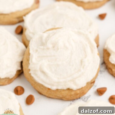 Iced Cinnamon Chip Cookies are soft, chewy, and full of warm spice—finished with a creamy vanilla frosting for the perfect sweet treat.