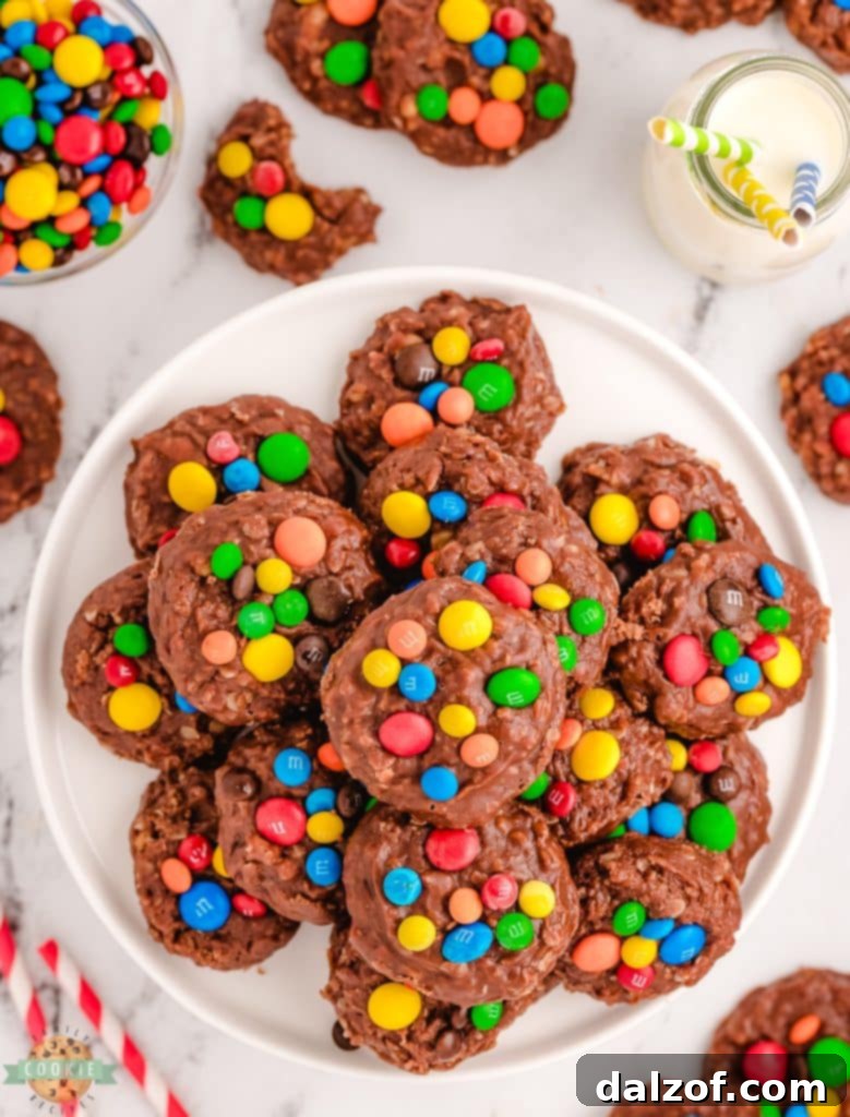 A plateful of vibrant No-Bake M&M Cookies, generously topped with colorful M&M candies.