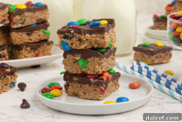 A delicious pan of No-Bake Monster Cookie Bars, loaded with M&M's and chocolate.