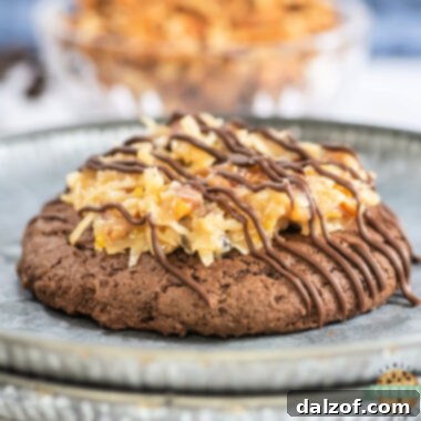 Copycat Crumbl German Chocolate Cake Cookies are rich, soft chocolate cookies topped with gooey coconut pecan frosting and a sweet drizzle.
