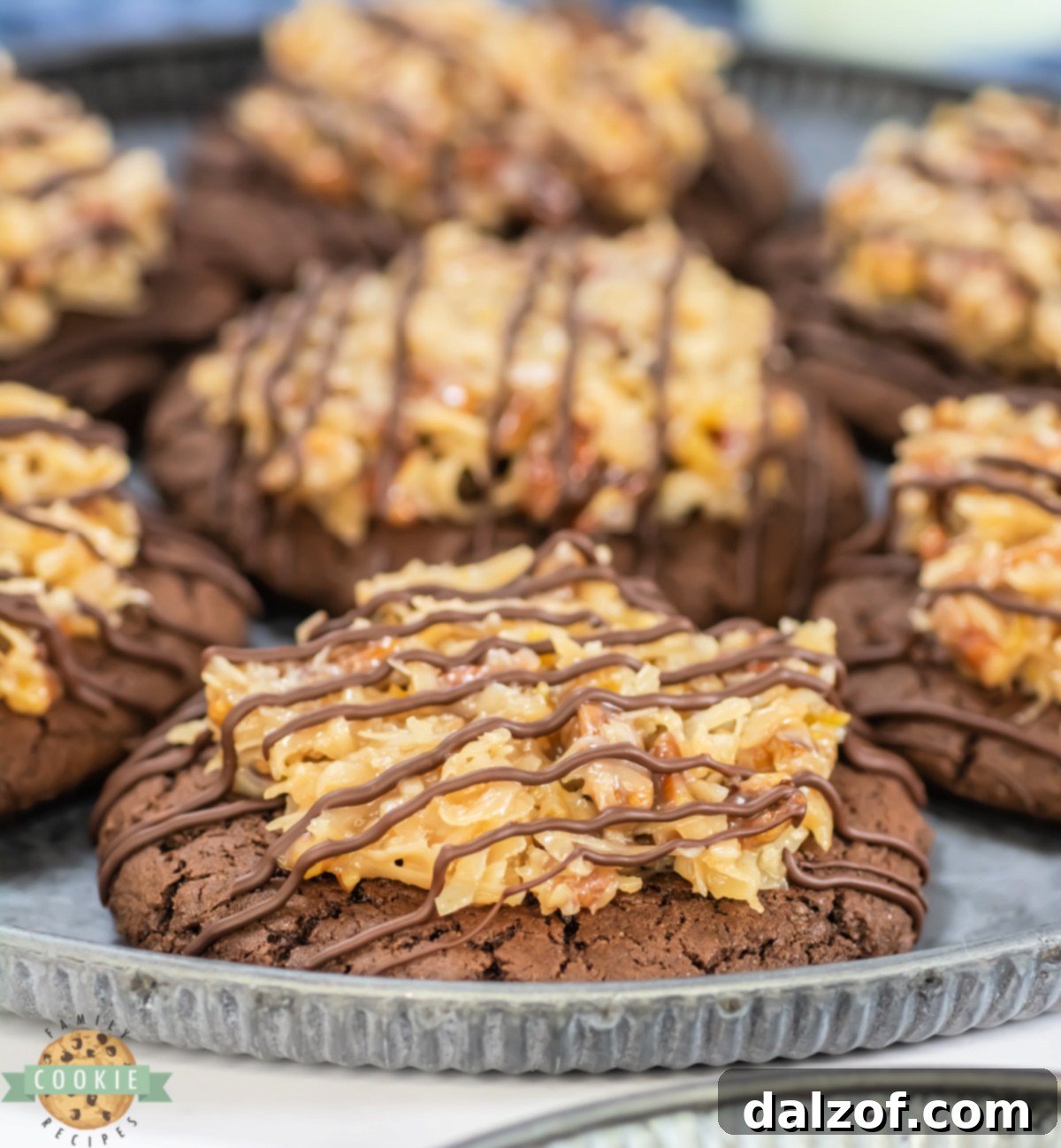 Crumbl Copycat German Chocolate Cake Cookies are rich, soft chocolate cookies topped with gooey coconut pecan frosting and a sweet drizzle.