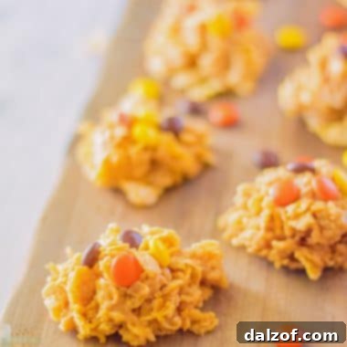 No-Bake Peanut Butter Cornflake Cookies with Reese's Pieces on top