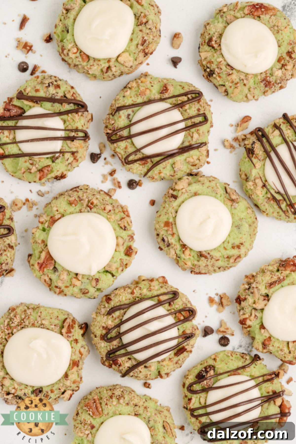 Pistachio thumbprint cookies with a creamy buttercream filling. 