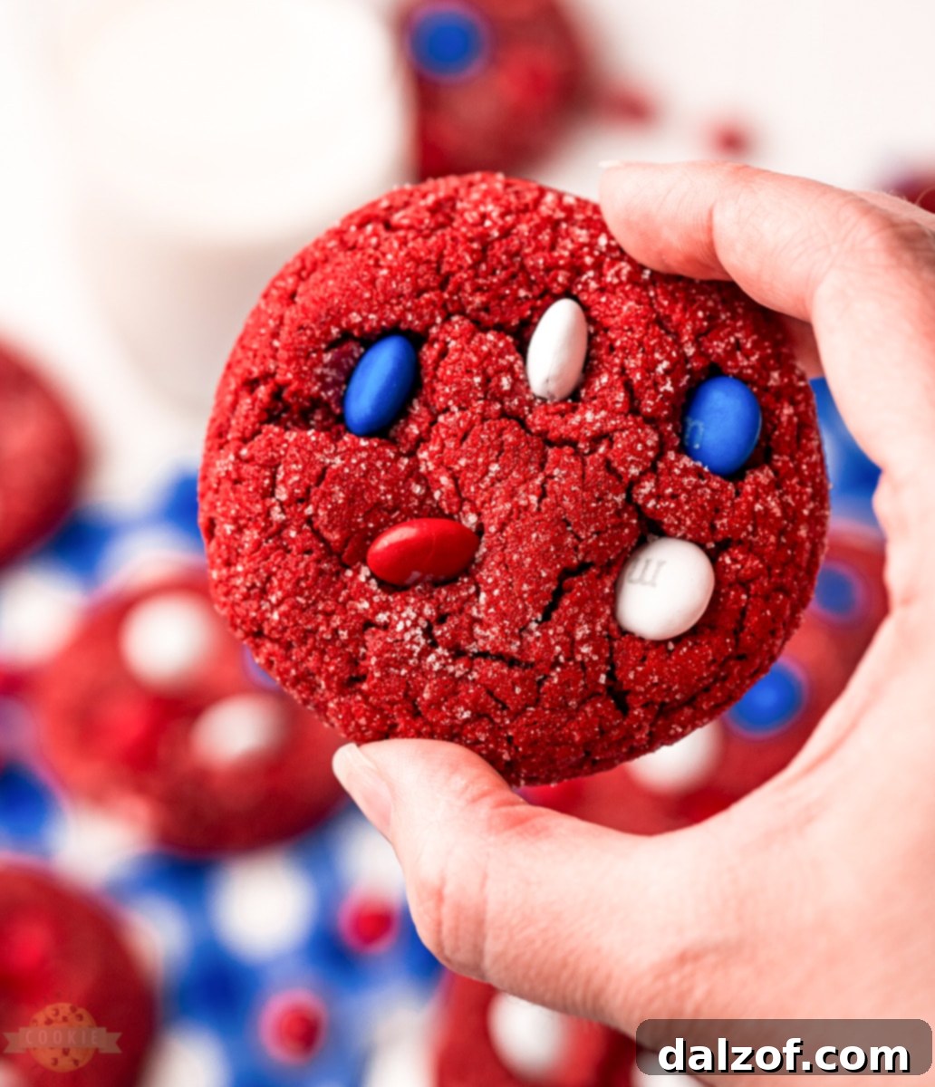 Ingredients for Red Velvet Cake Mix Cookies including cake mix, oil, eggs, M&Ms, and sugar