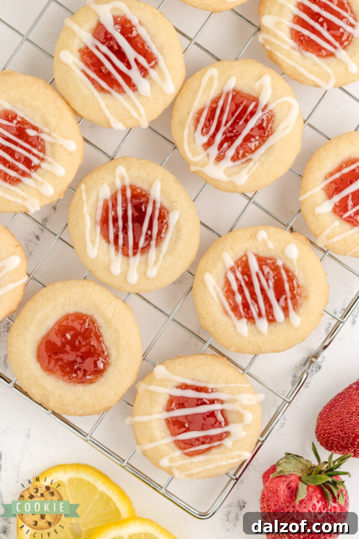 Lemon thumbprint cookies with a strawberry filling. 
