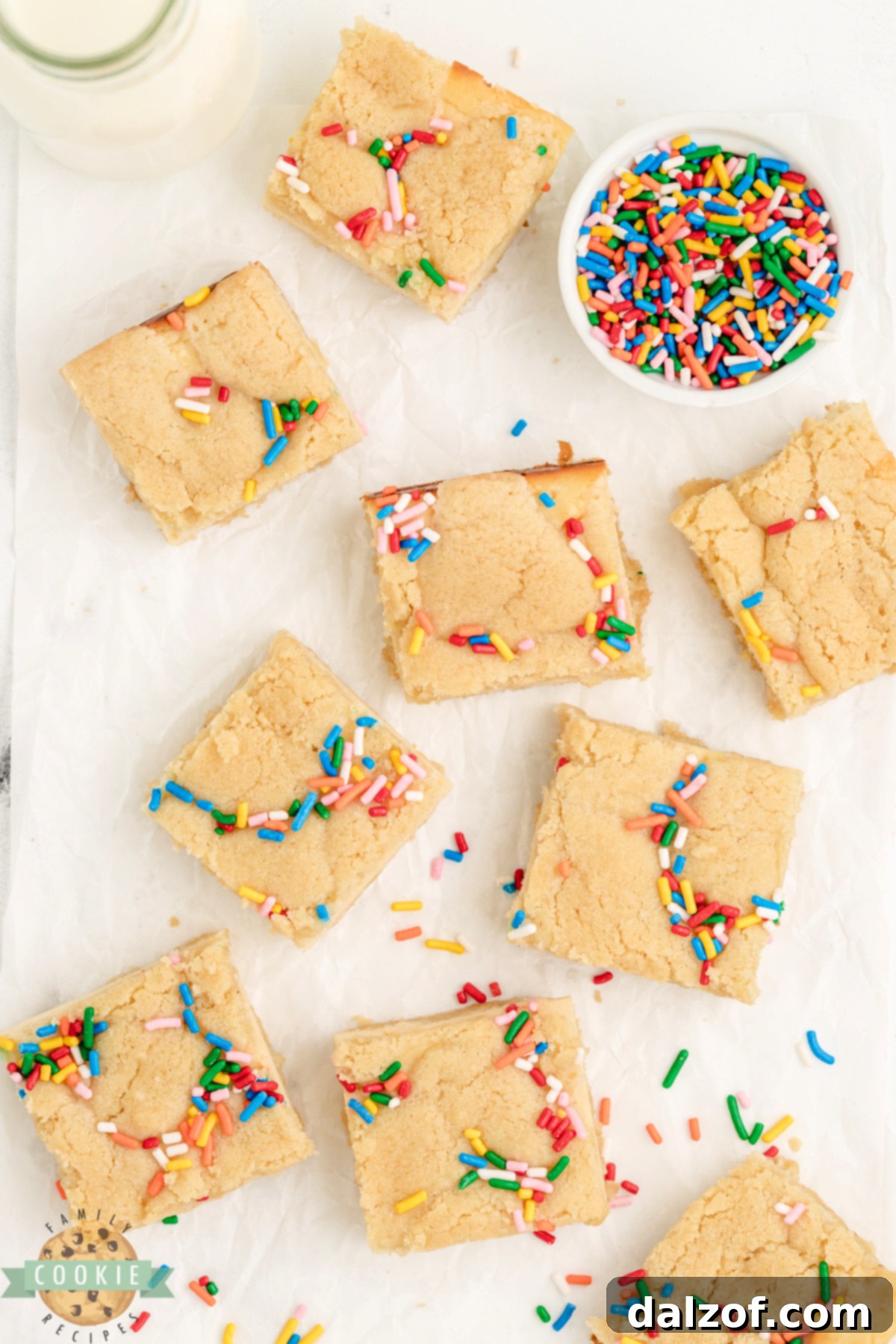 Cheesecake Sugar Cookie Bars are easy to make and delicious to eat! Just 6 ingredients for soft cookie crust and creamy cheesecake center.