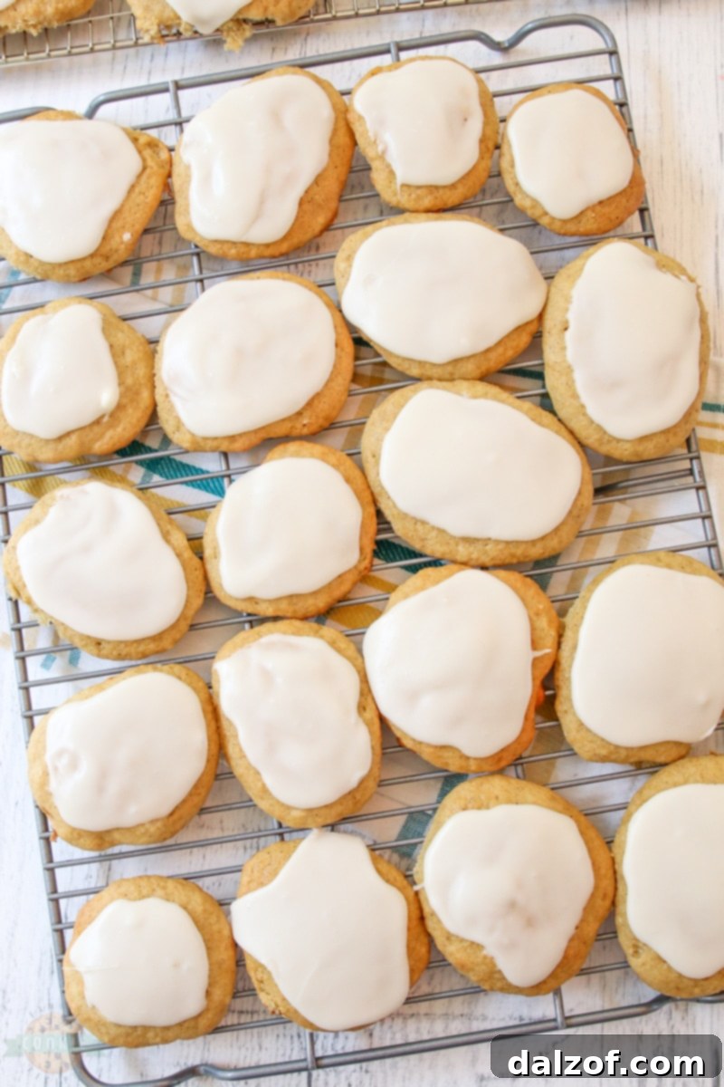 Scooping banana bread cookie dough onto a baking sheet