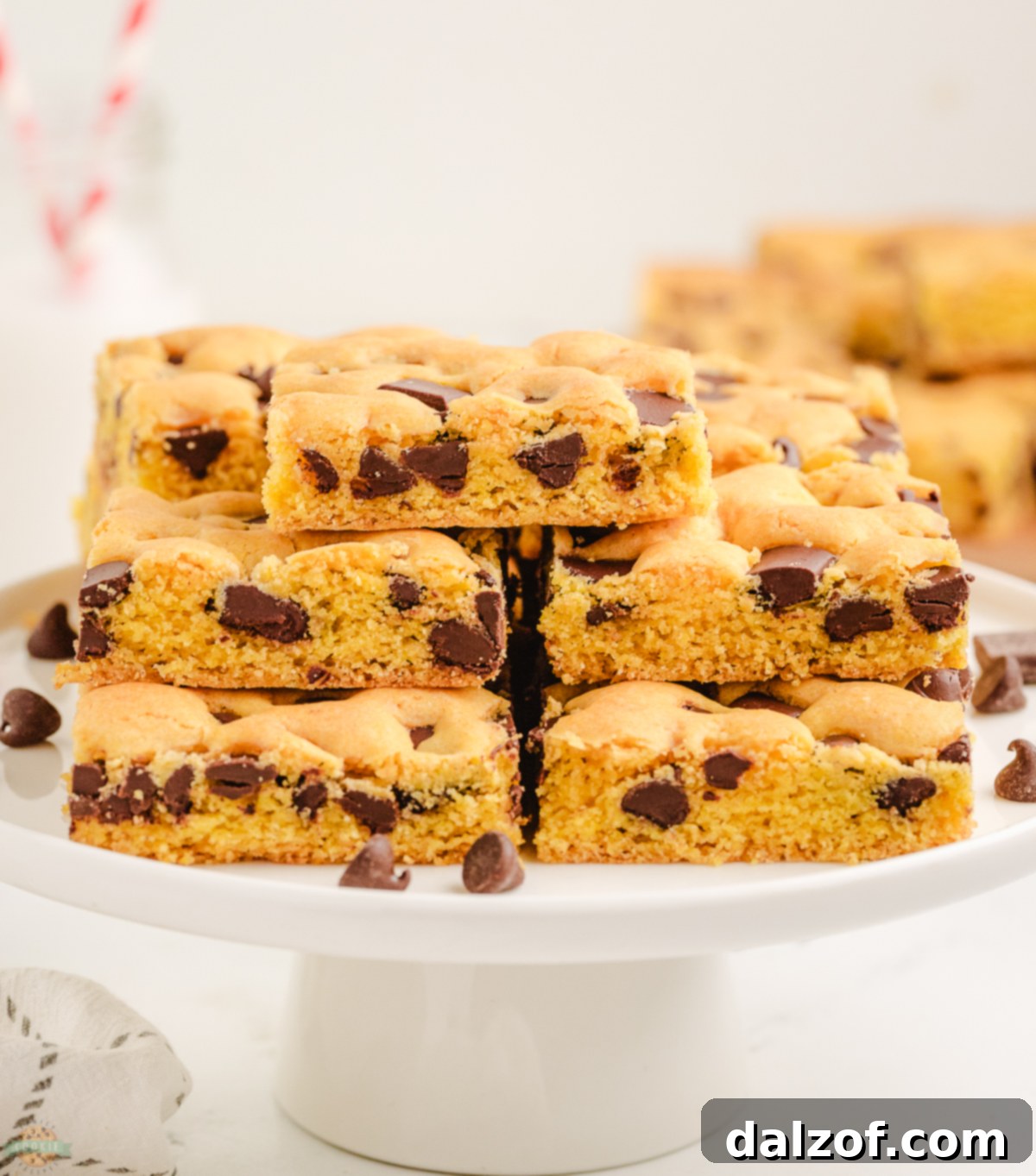 stack of cake mix chocolate chip cookie bars on a cake stand