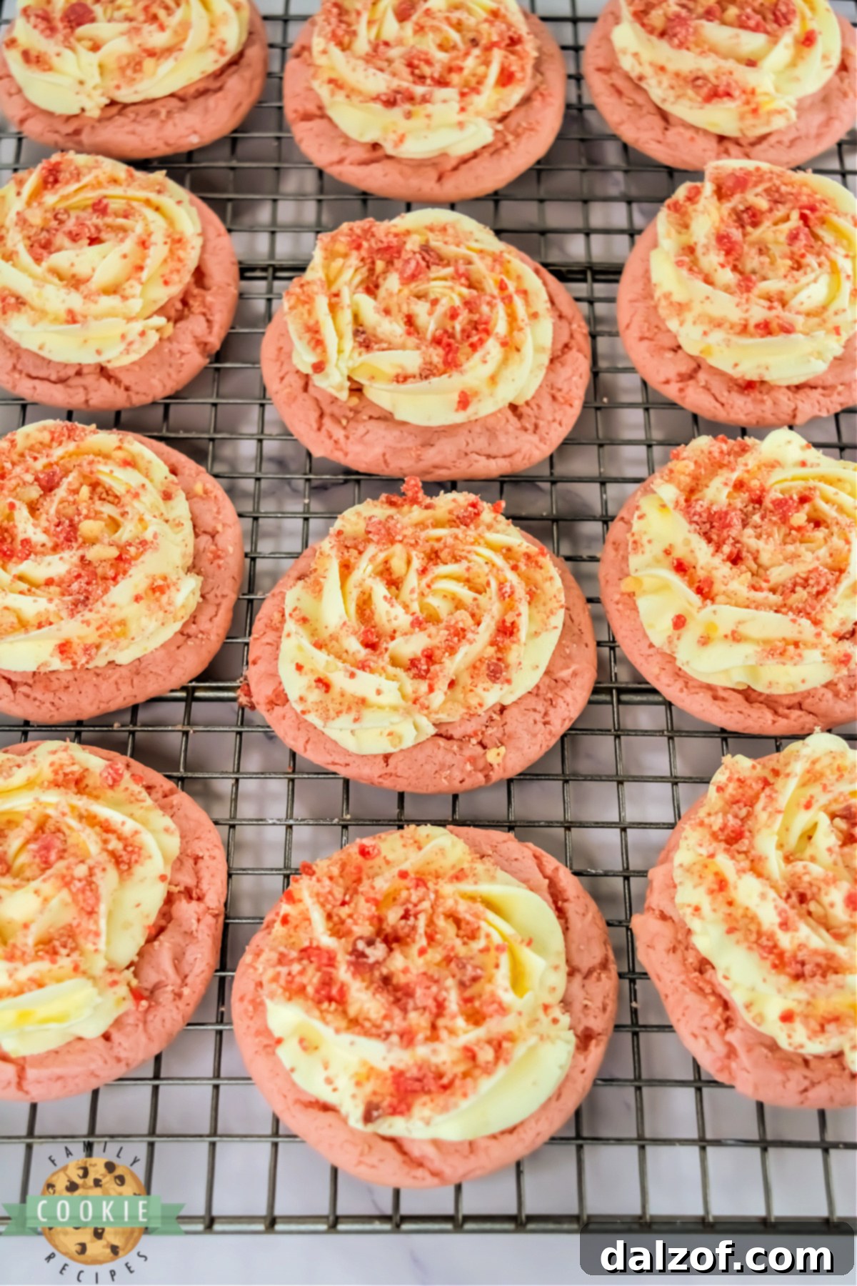 Copycat Crumbl Strawberry Shortcake Cookies on a wire rack.