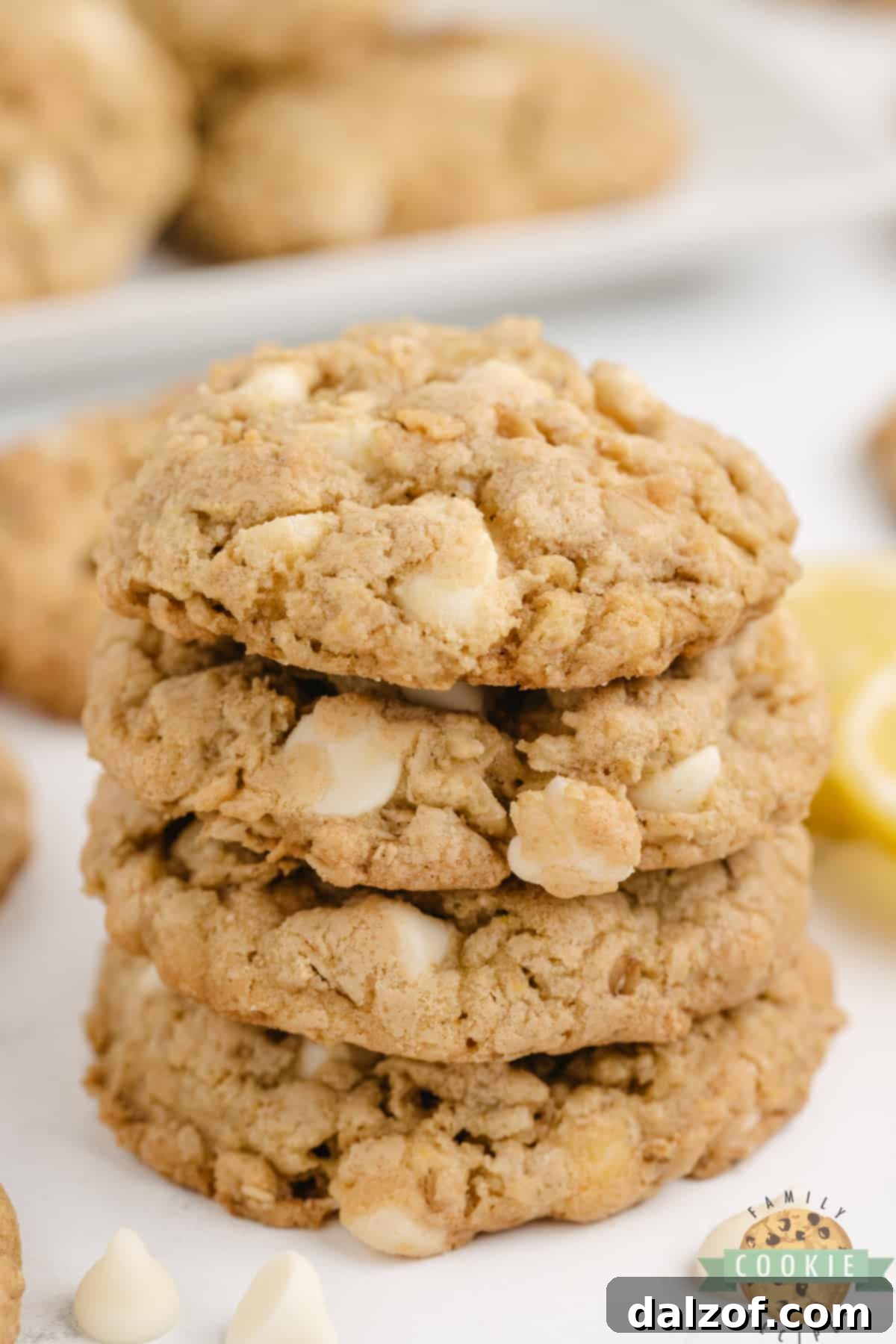 A tall stack of golden brown Lemon Oatmeal Cookies.