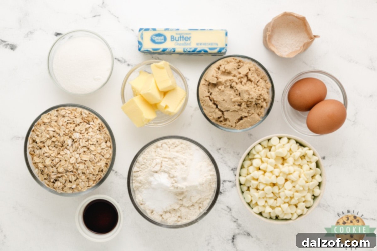 Key ingredients for Lemon Oatmeal Cookies laid out on a surface.