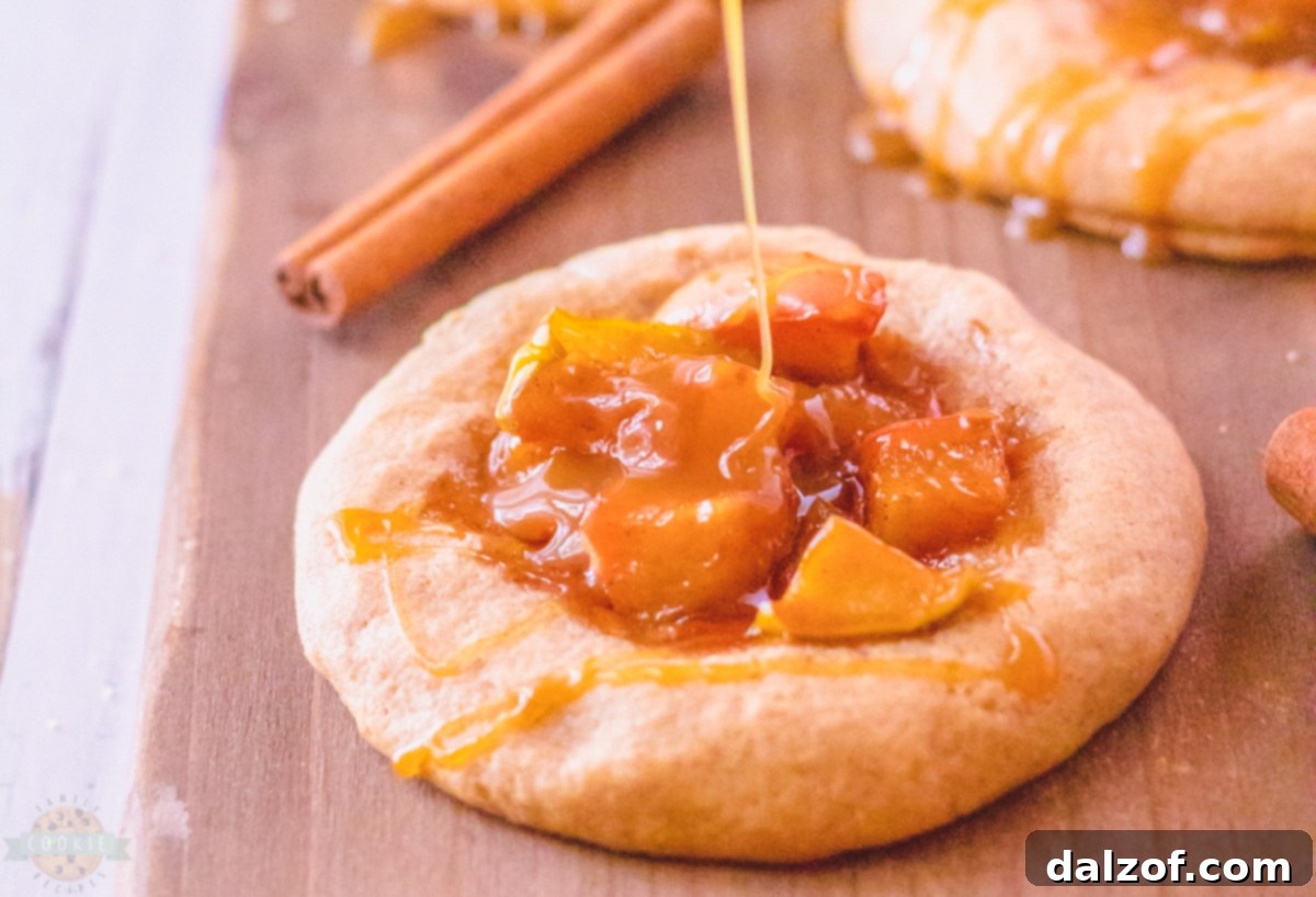 Caramel Apple Pie Cookies on a cooling rack, freshly baked