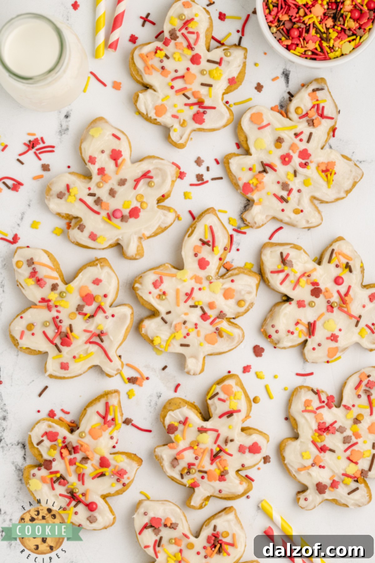 Overhead view of frosted Pumpkin Sugar Cookies ready to serve.