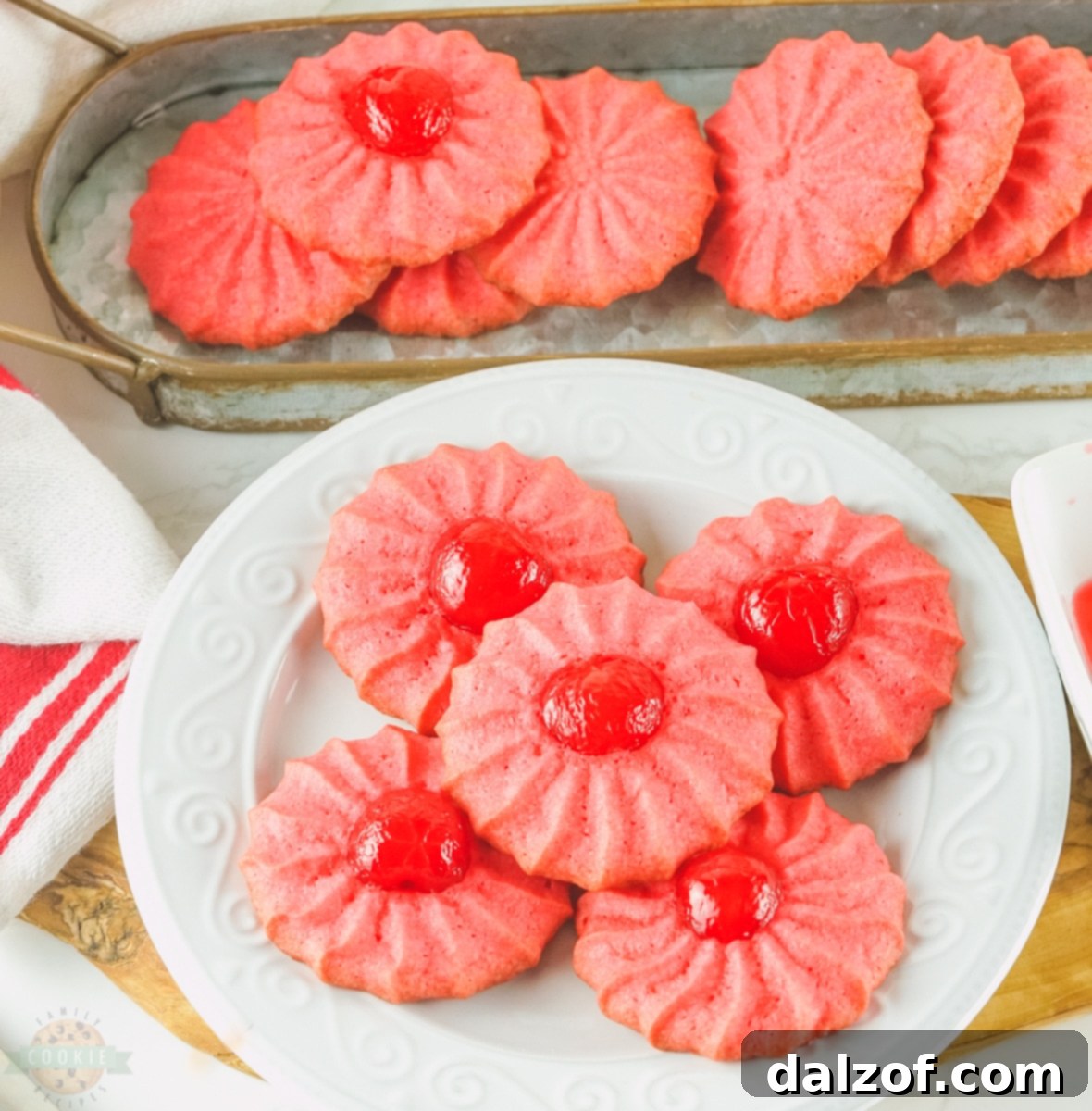 Vibrant red Cherry Jello Cookies on a white plate