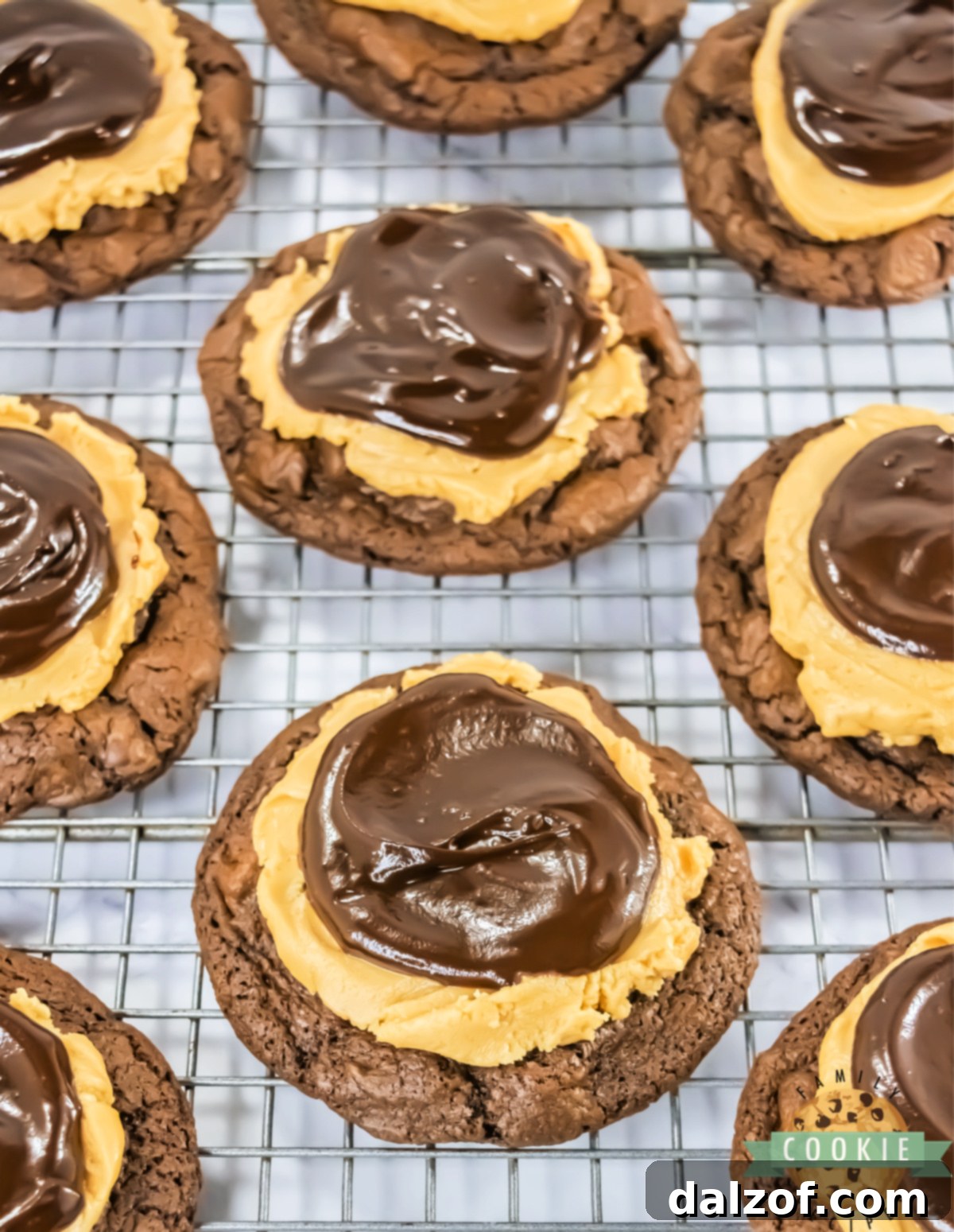 Gourmet Buckeye Brownie Cookies 9 Crumbl Copycat Buckeye Brownie Cookies are rich, decadent, triple-layered cookies inspired by the classic peanut butter buckeye candy, perfect for any occasion.