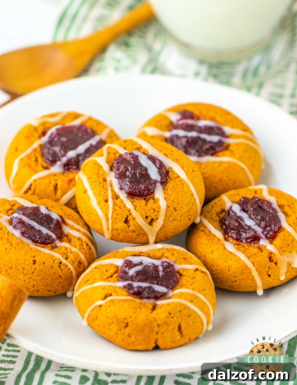 A festive spread of Gingerbread Thumbprint Cookies with Cranberry Sauce, ready for holiday celebrations.