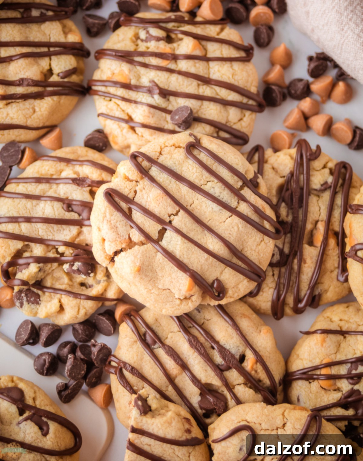 Scotcharoo cookies drizzled with melted chocolate