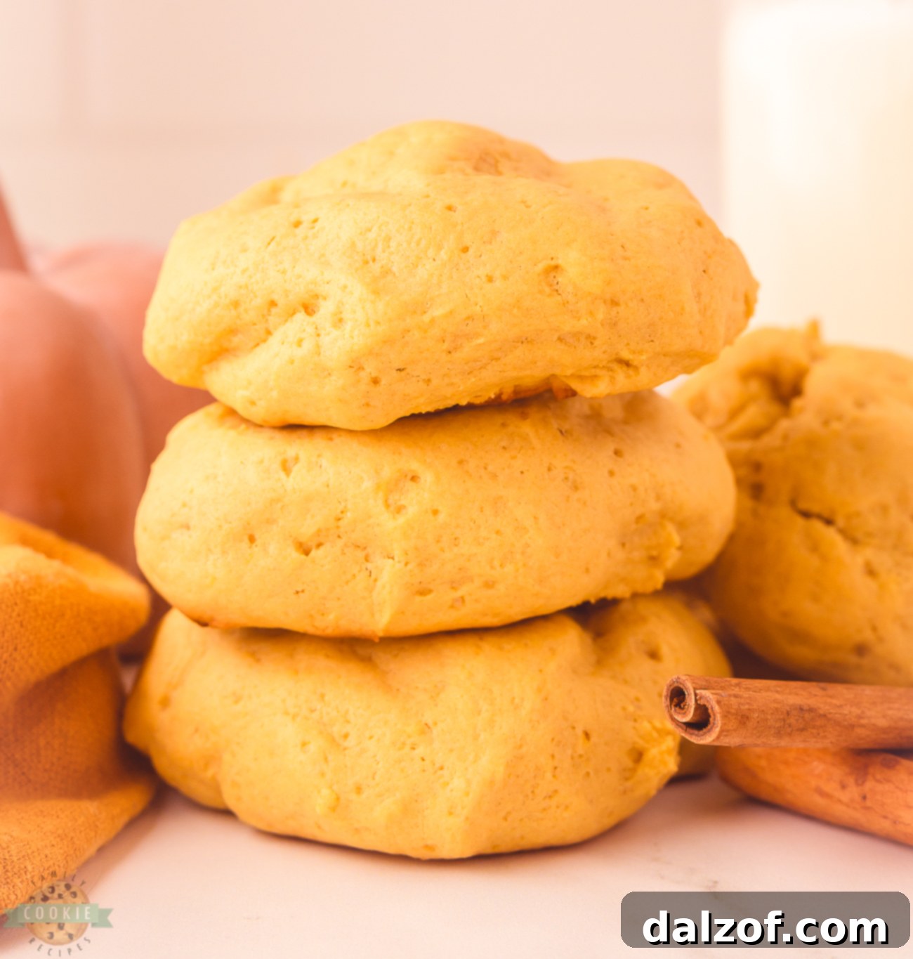 soft pillowy pumpkin cookies with cheesecake filling