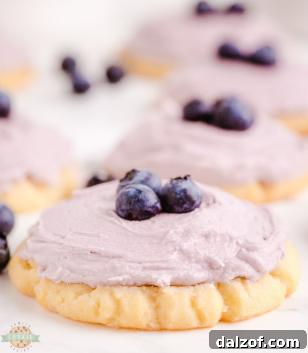 Ingredients laid out for blueberry sugar cookies, including butter, flour, sugar, and extracts.