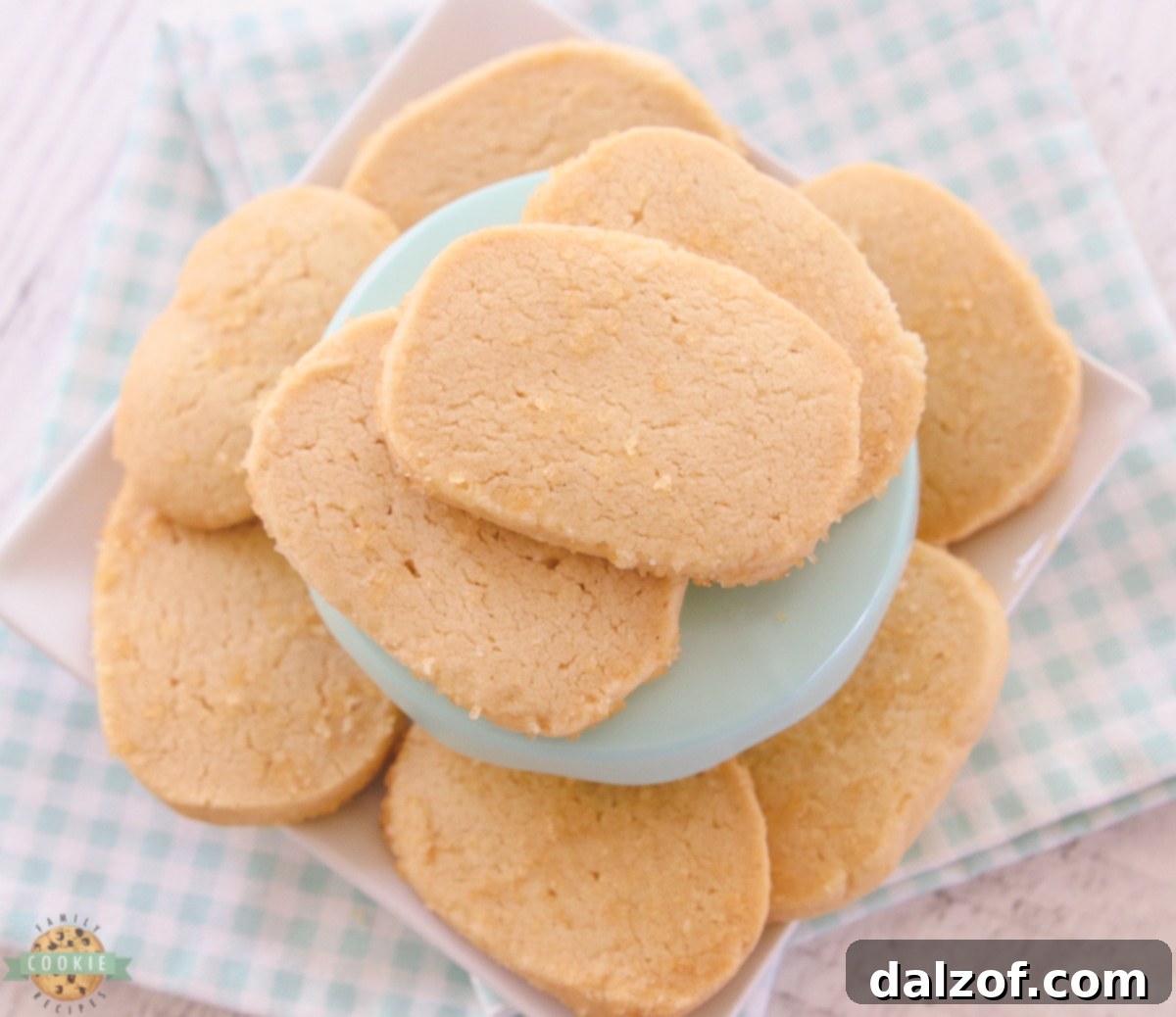 Close-up of golden brown vanilla slice and bake cookies on a cooling rack