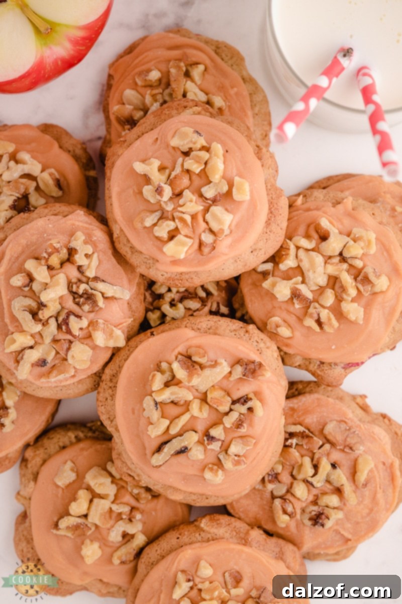 Freshly baked butterscotch apple cookies ready to be glazed