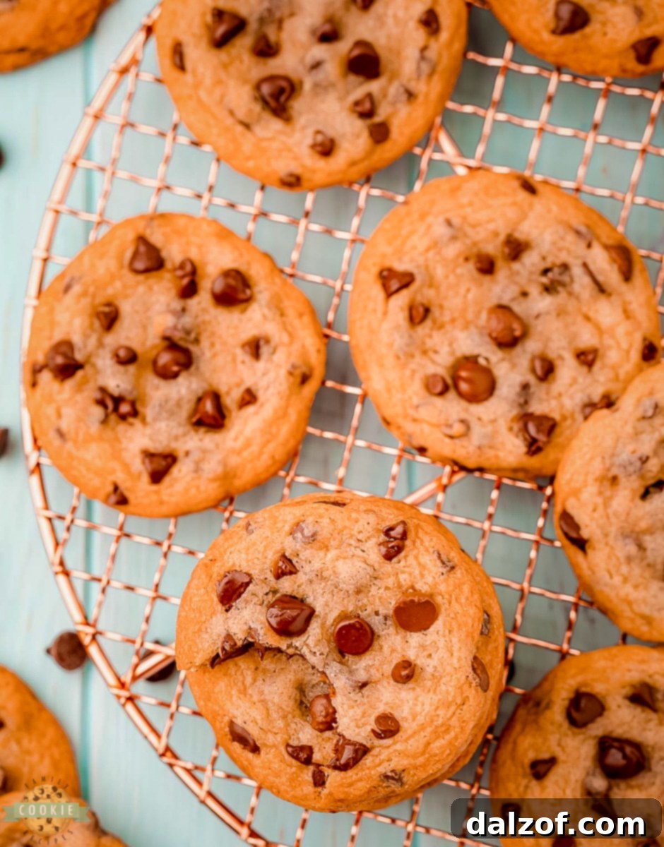 Cookie dough balls on a baking sheet before baking