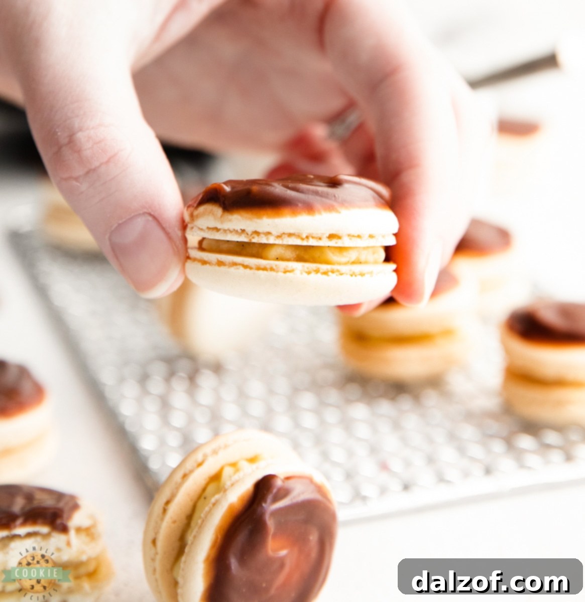 Macaronage process for Boston Cream Pie Macarons