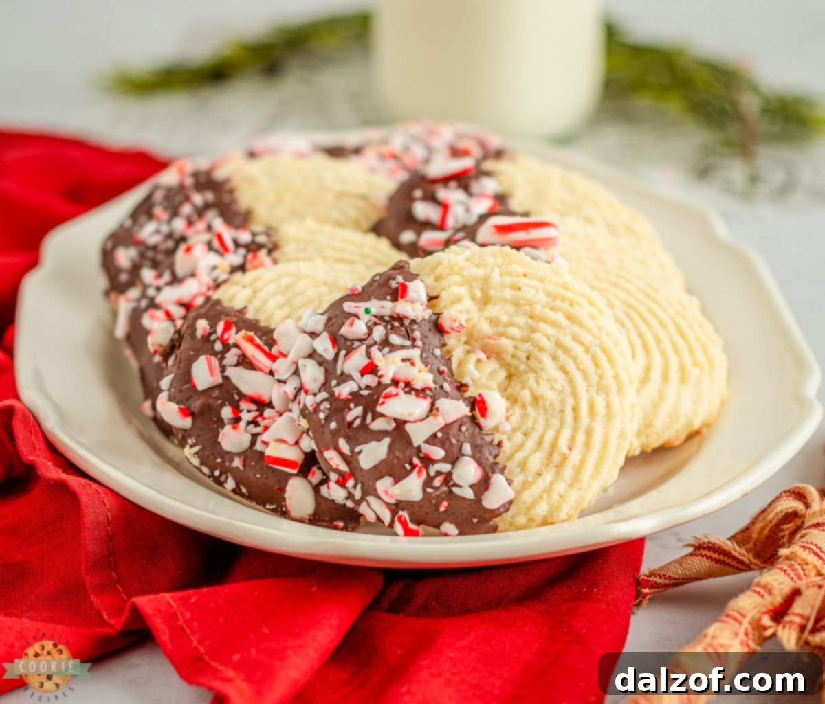 Baked peppermint butter cookies cooling on a wire rack, ready for the next step of decoration