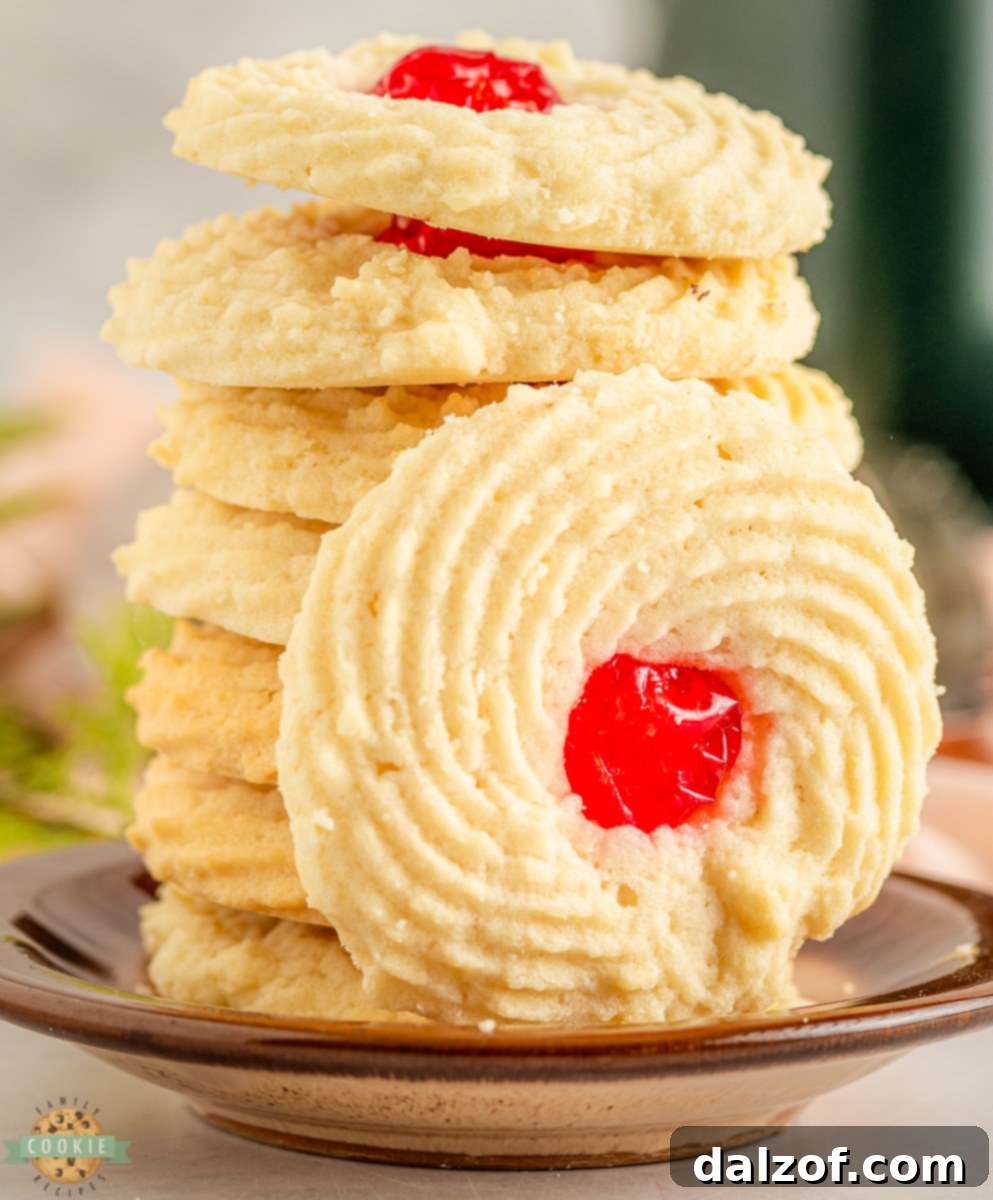 Cherry Butter Cookies recipe featuring buttery shortbread and a vibrant maraschino cherry