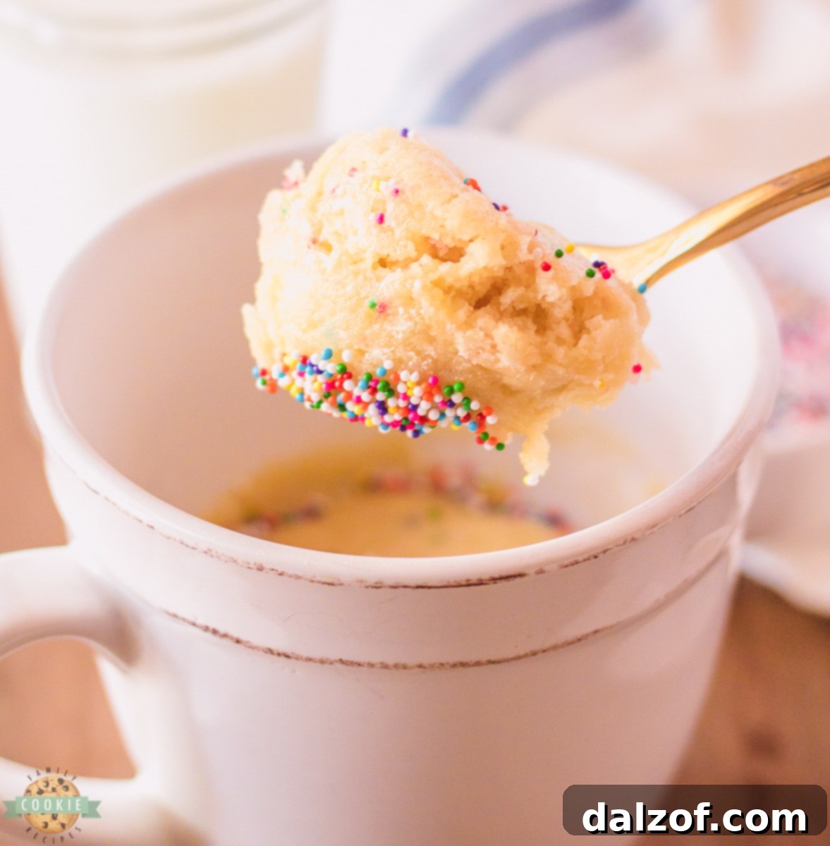 Warm and delicious Sugar Cookie in a Mug, topped with sprinkles.
