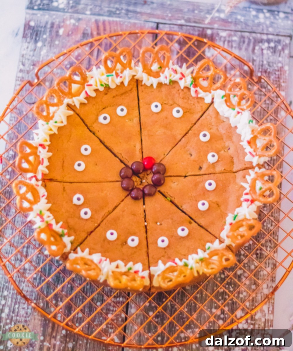 Festive Reindeer Cookie Cake decorated with candy antlers and eyes.