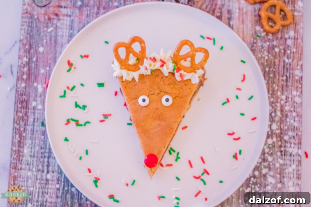 Finished Reindeer Cookie Cake with frosting and candy decorations.