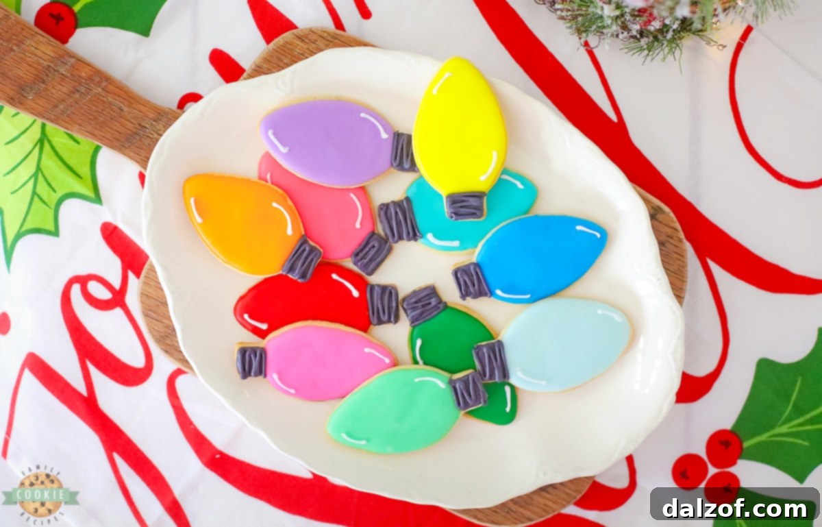 Assortment of freshly baked and decorated Christmas Lights Cut Out Cookies