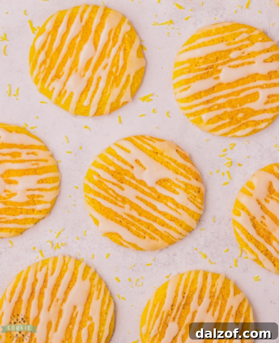Cookie dough mixture with a vibrant yellow hue, ready for chilling.