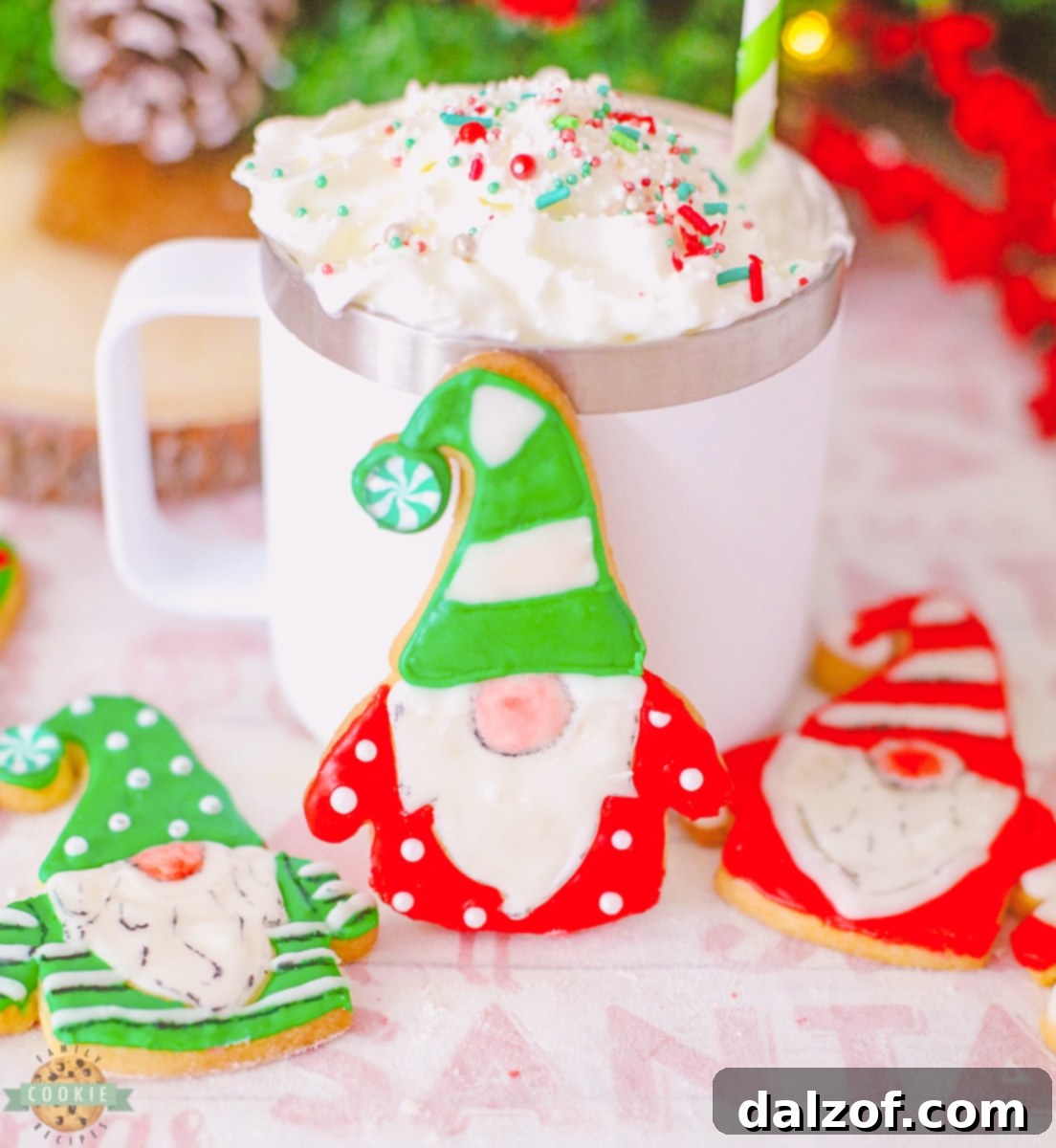 how to make iced gnome christmas cookies - a close up of several decorated gnome cookies arranged on a platter, showcasing their colorful hats, fluffy white beards, and tiny noses.