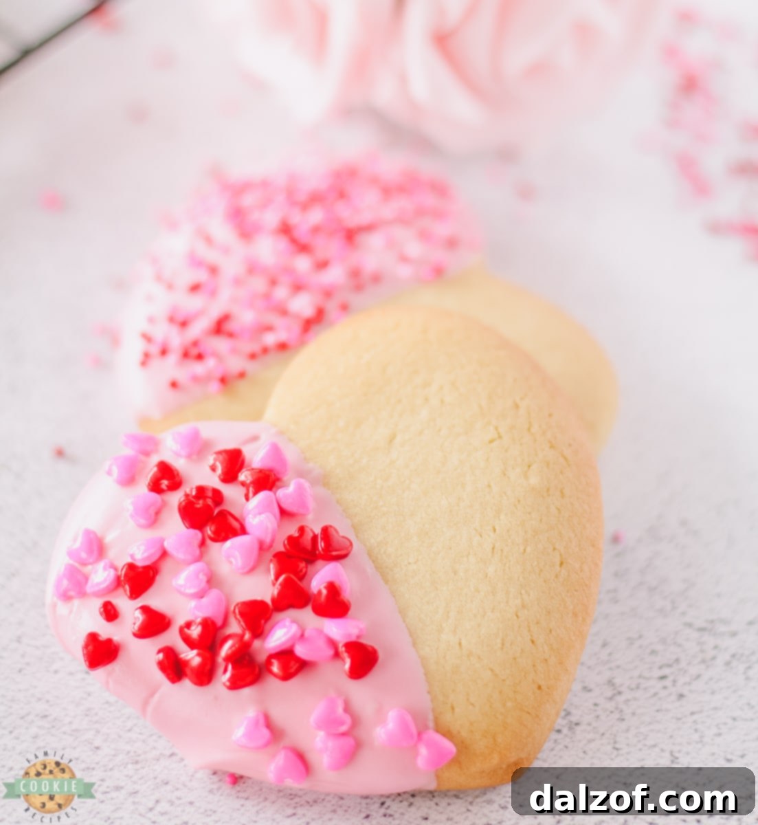 Stacked Valentine Heart Cookies with pink chocolate and sprinkles