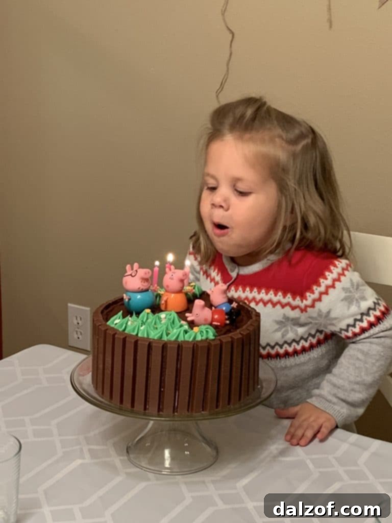 A happy 3-year-old celebrating her birthday